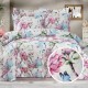 Lenjerie de pat dublu creponata din bumbac 100% cu imprimeu floral flori de cires roz si cearceaf cu elastic pentru saltea 180x200 cm.