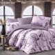 Lenjerie de pat dublu colecția Dream Nazenin Home cu 6 piese și design floral și geometric în nuanțe de lila și gri pe fundal lila deschis.